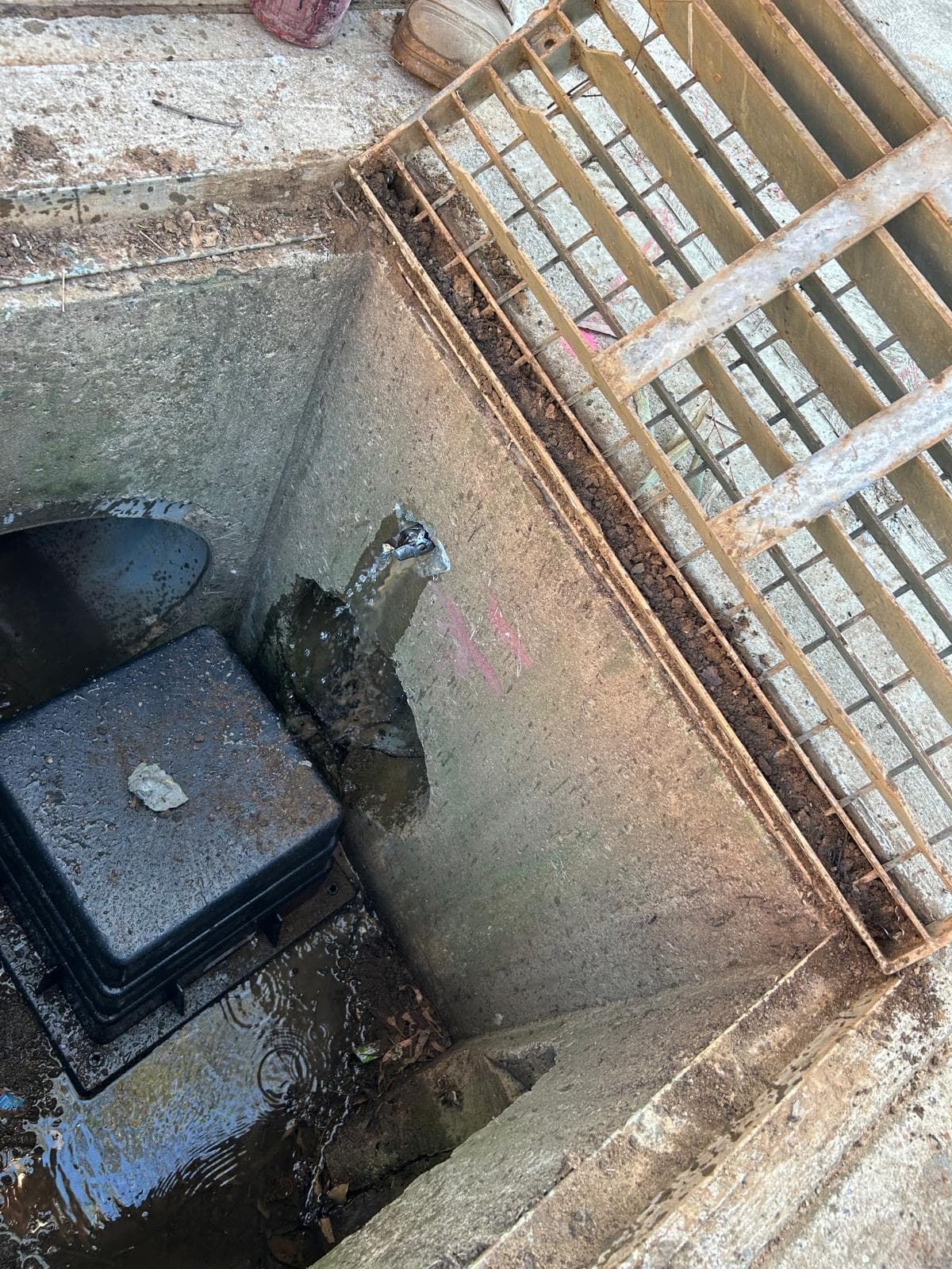 Water flowing from a bore hole into a stormwater pit